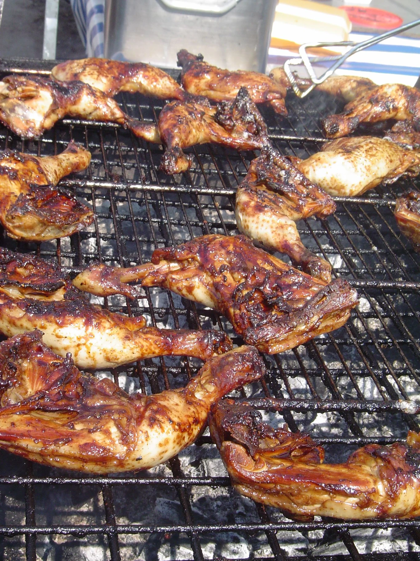 Chicken on a barbecue grill at the Kwakoe festival in 2003