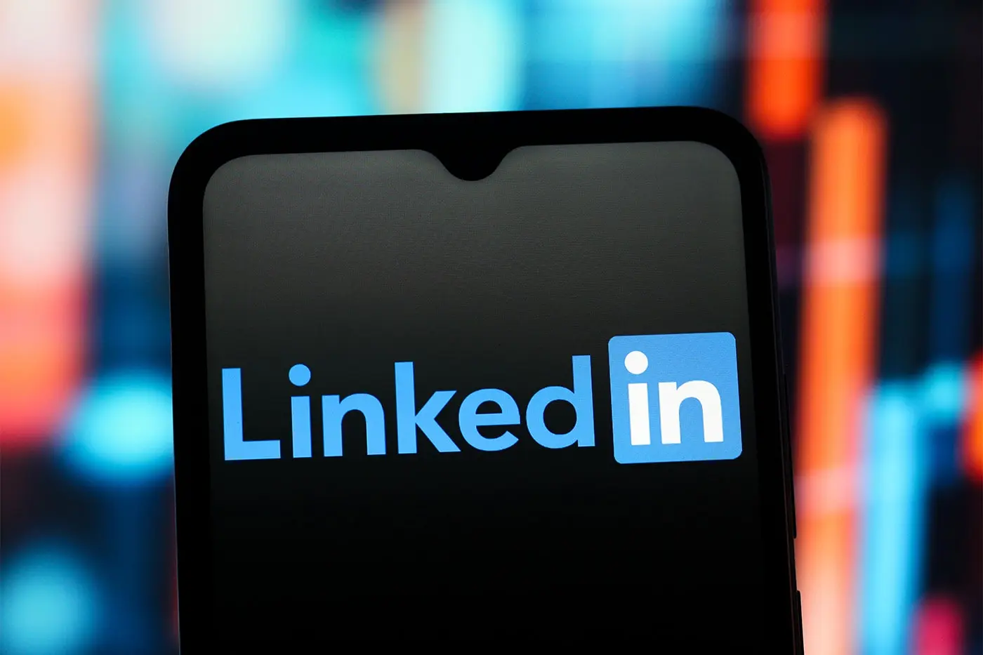 LinkedIn mobile interface showing the new reporting dropdown menu with the Seems like AI slop option highlighted
