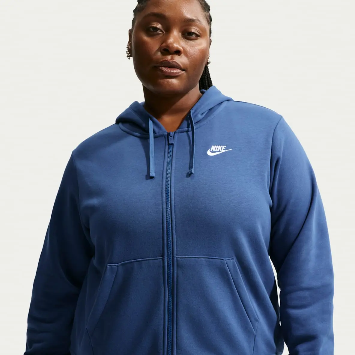 Nike apparel piece from the One Piece collection in cream and navy tones
