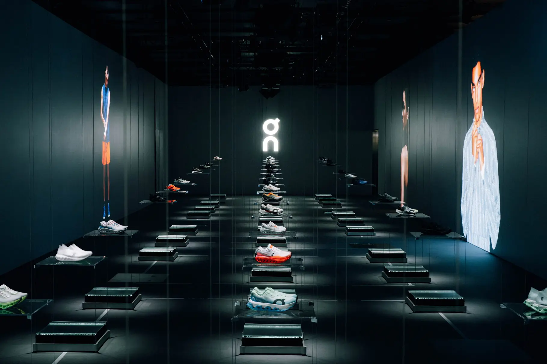 On Running footwear displayed at an investor event presentation