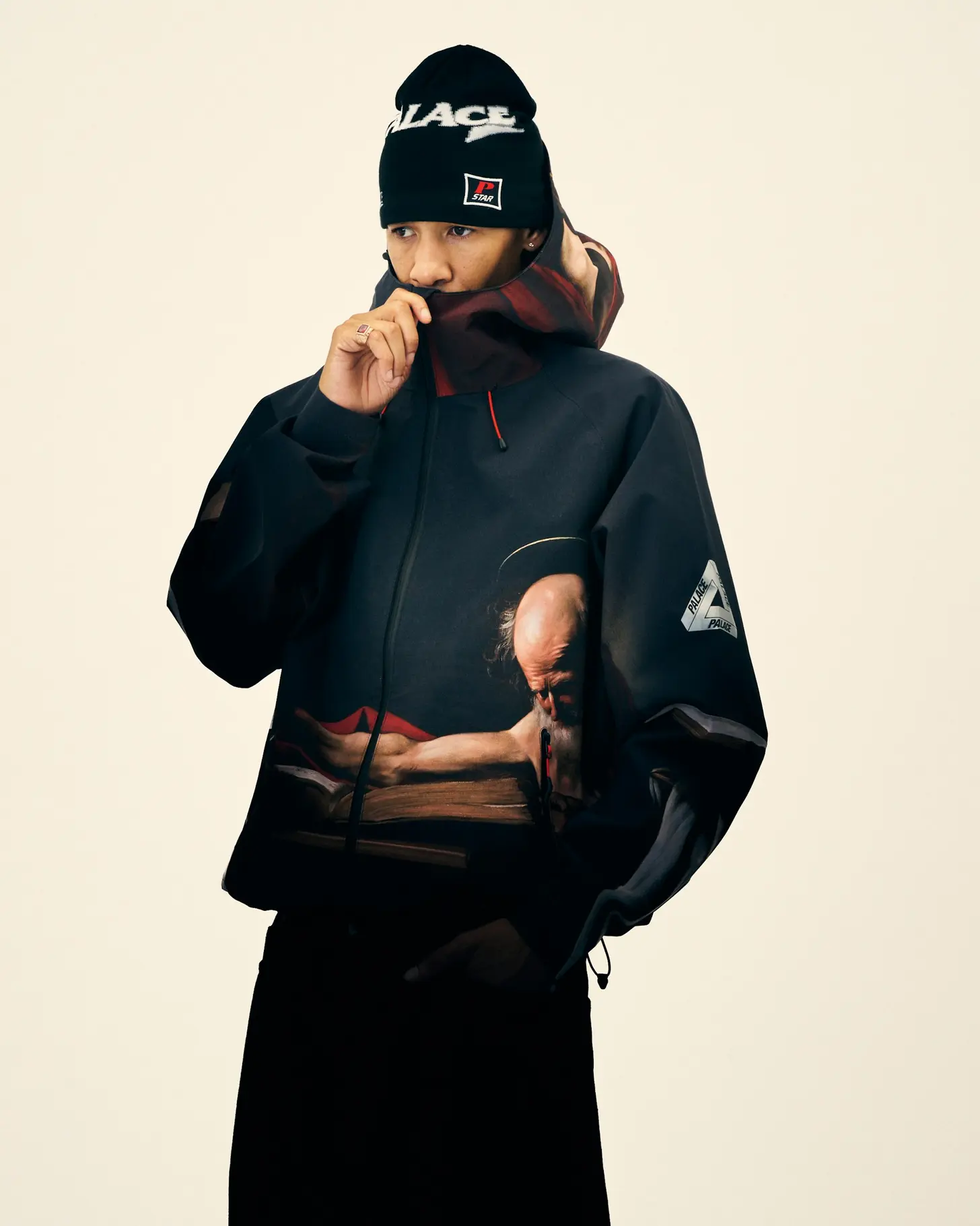 Model wearing Realtree camo recon jacket and overpants from Palace Winter 2026 lookbook