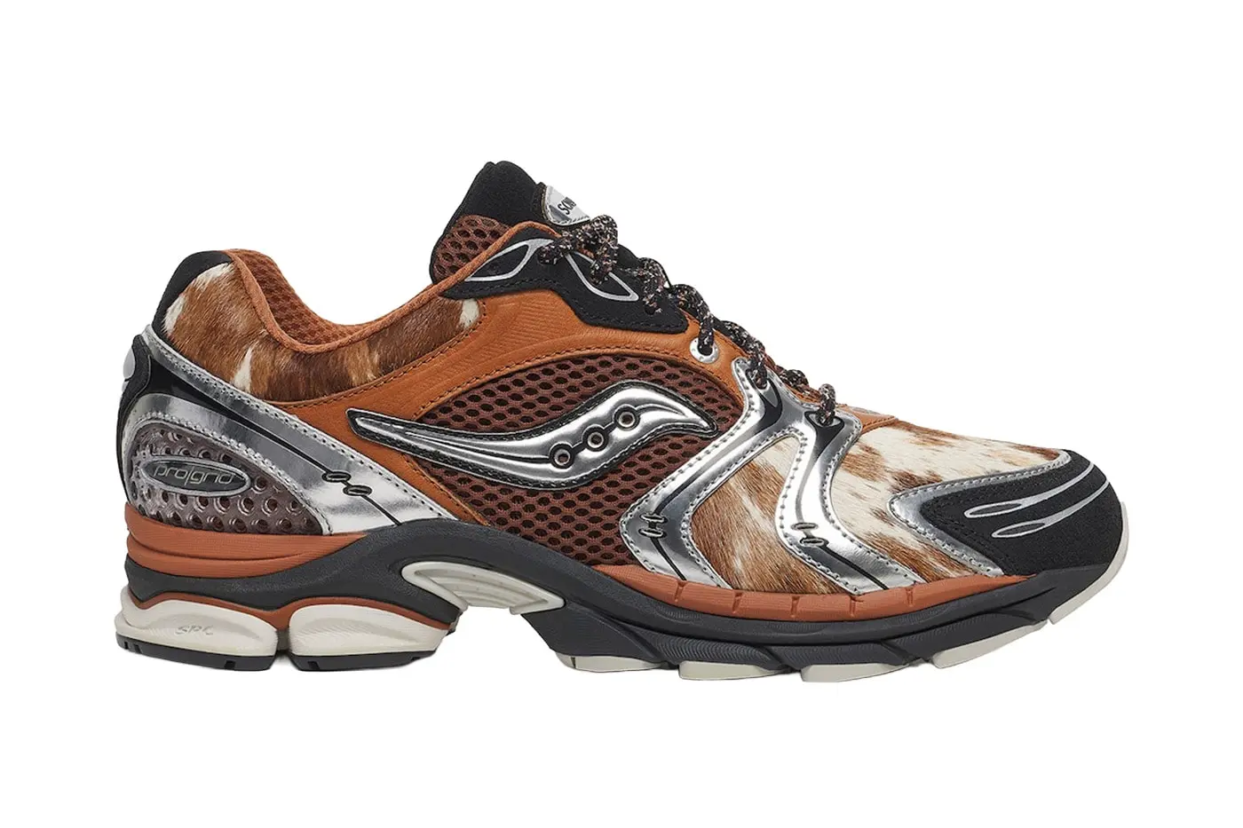 All five Space Cowboy shoes arranged together, showing the shared burnt-orange treatment across silhouettes