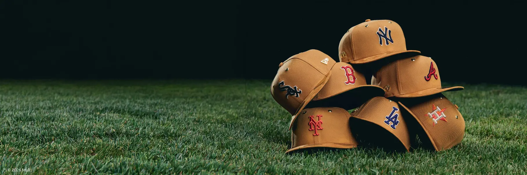 Y's x New Era FW26 capsule cap and apparel on display